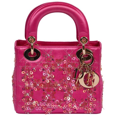 hot pink dior bag.